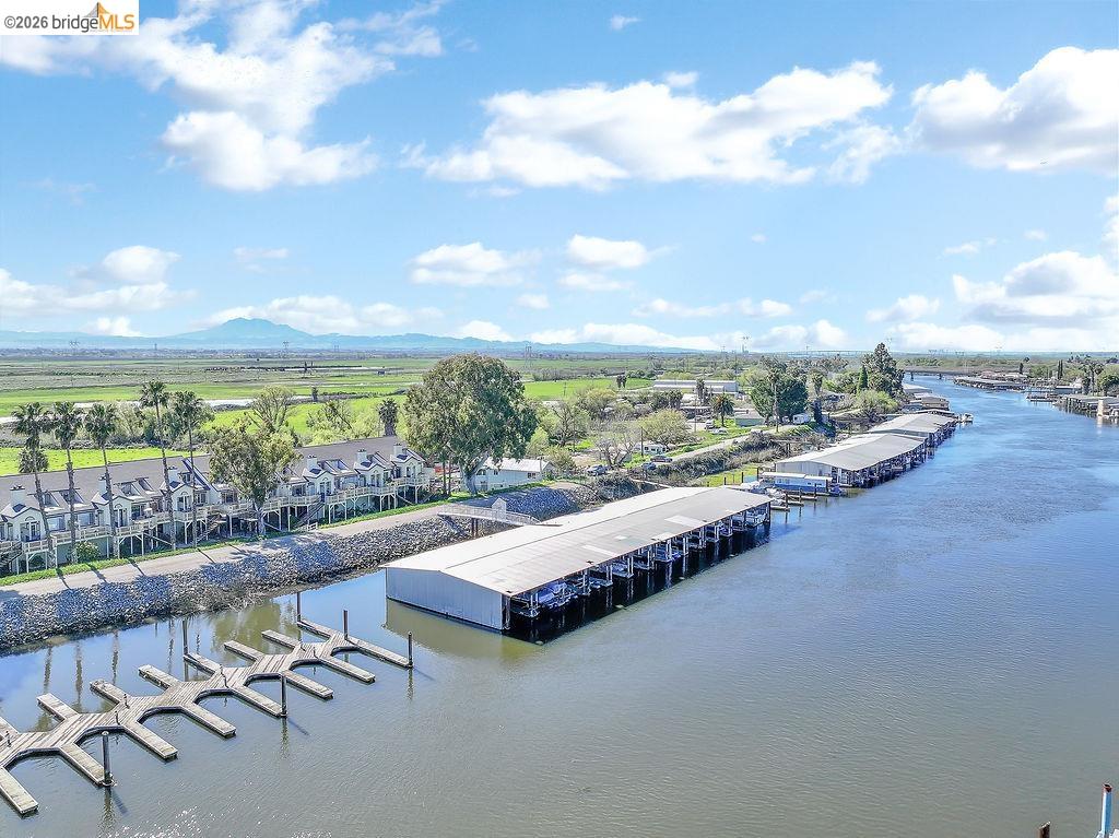 3487 Wells Road Oakley, CA 94561 - Photo 5 of 30 Aerial view of residential area featuring a water and mountain view