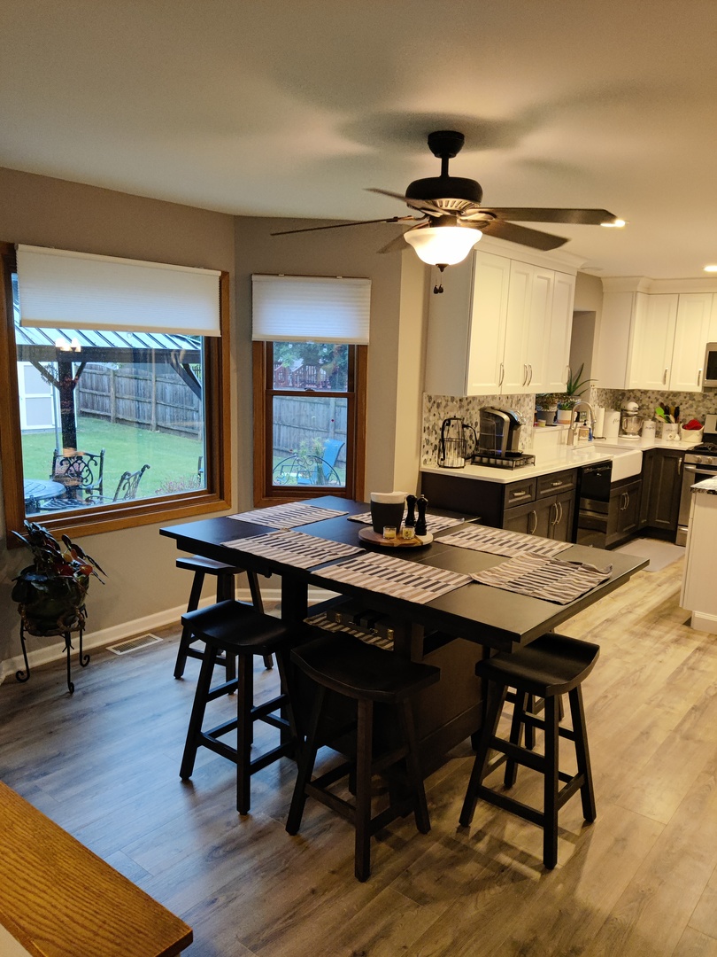 1681 Boulder Ridge Drive Bolingbrook, IL 60490 - Photo 8 of 17 a view of a dining room with furniture window and wooden floor