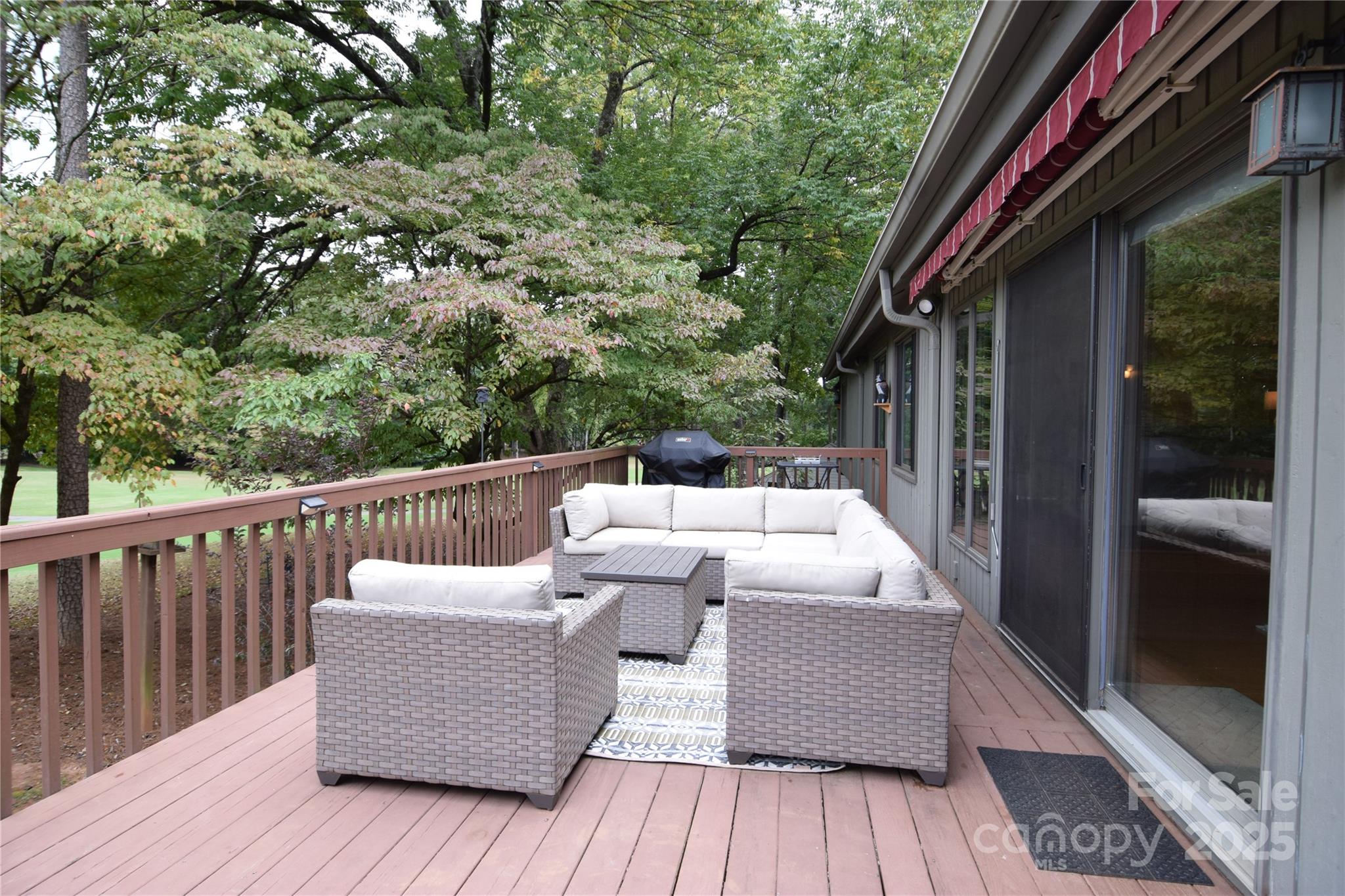 100 Fairway Ridge Clover, SC 29710 - Photo 12 of 45 a roof deck with couches and wooden floor