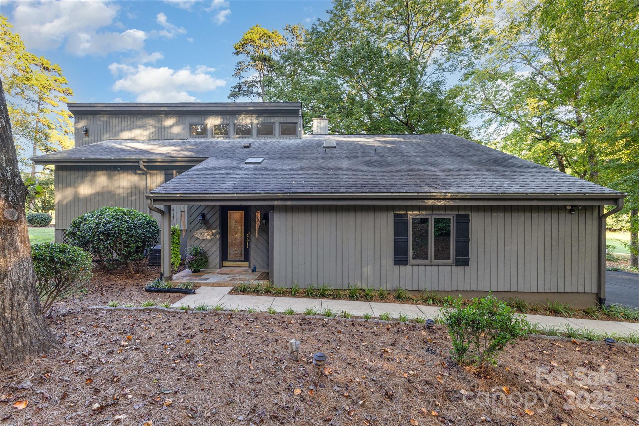 100 Fairway Ridge Clover, SC 29710 - Photo 2 of 45 a front view of house with a garden