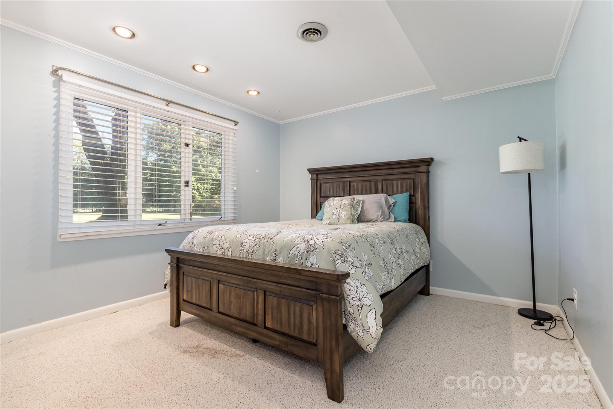 100 Fairway Ridge Clover, SC 29710 - Photo 39 of 45 a bed sitting in a room next to a window