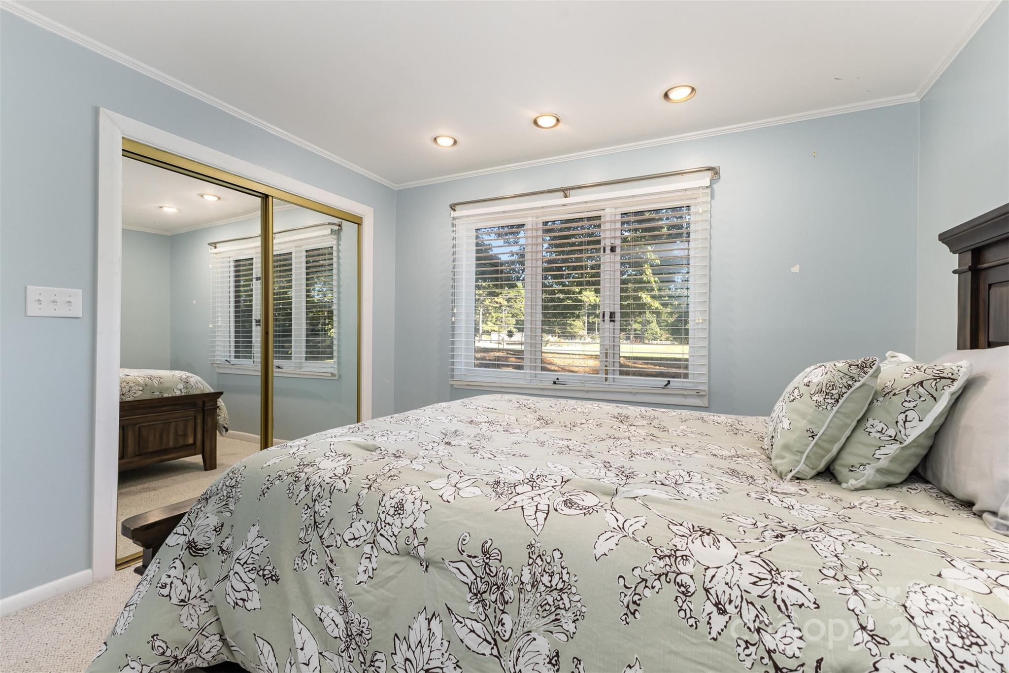 100 Fairway Ridge Clover, SC 29710 - Photo 40 of 45 a bedroom with a bed and a large window