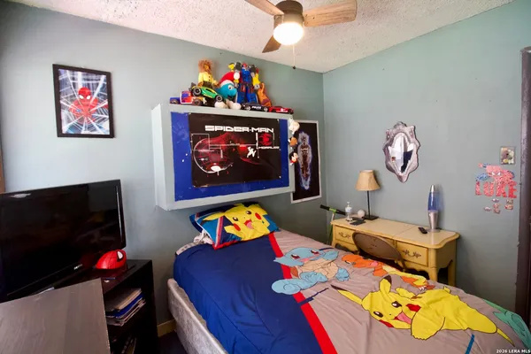 a bedroom with furniture and a bed