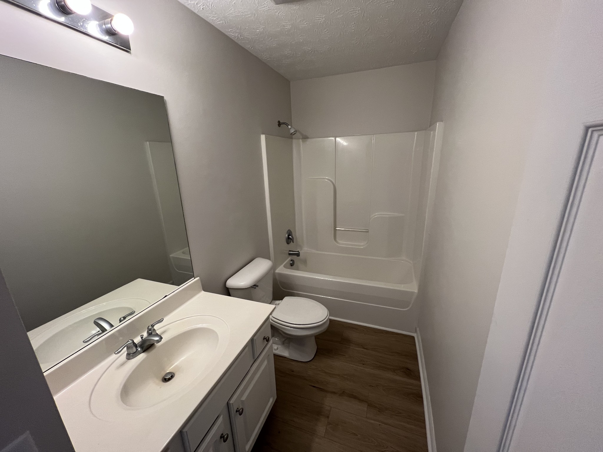 3965 Stephens Ridge Way Antioch, TN 37013 - Photo 14 of 17 a bathroom with a sink a toilet and shower