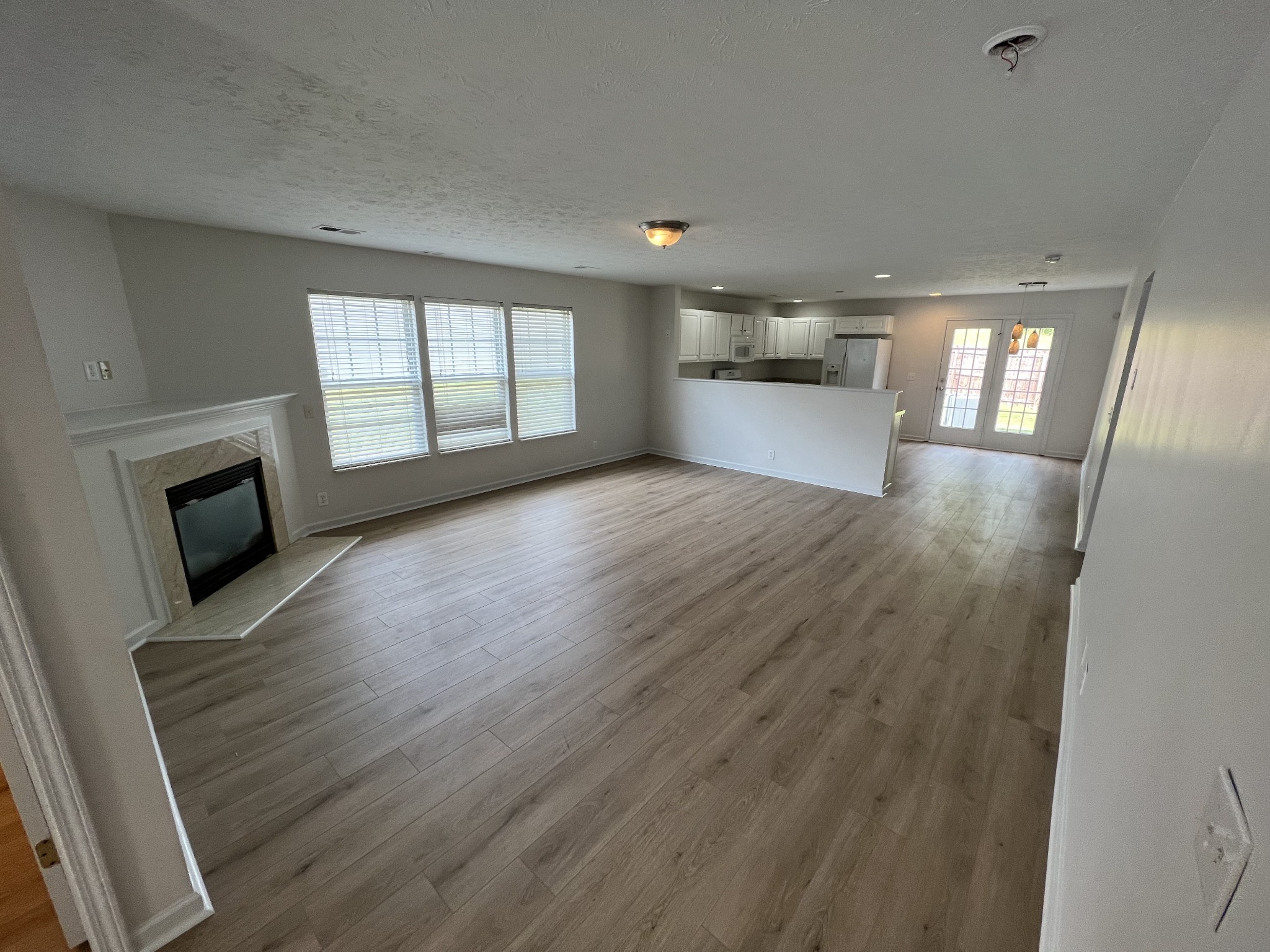 3965 Stephens Ridge Way Antioch, TN 37013 - Photo 3 of 17 an empty room with windows and fireplace