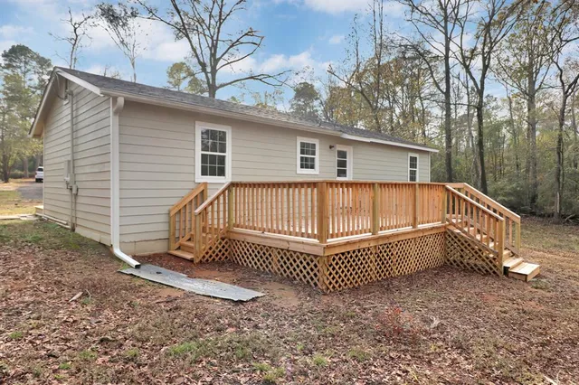 a view of a porch with a yard