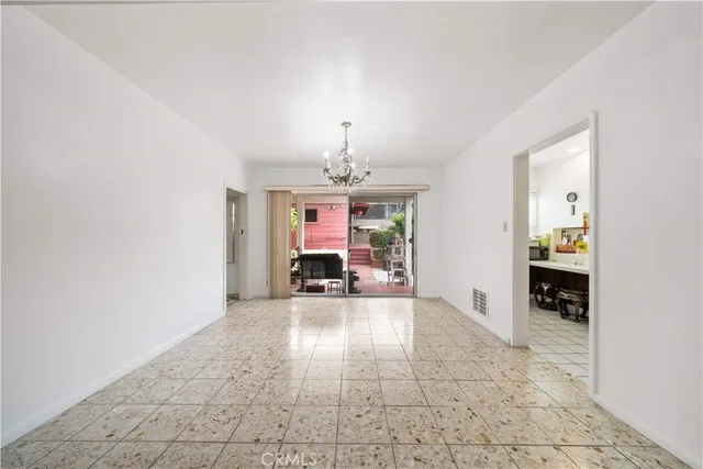 a utility room with cabinets