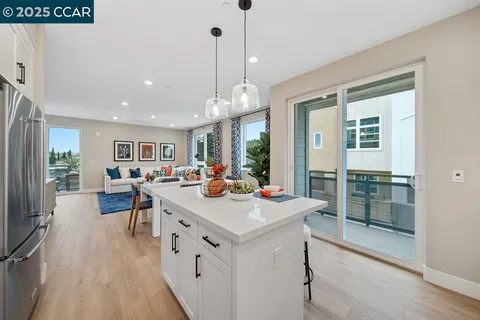 a view of a kitchen and living room