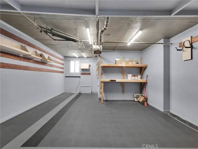 an aerial view of multiple houses with yard