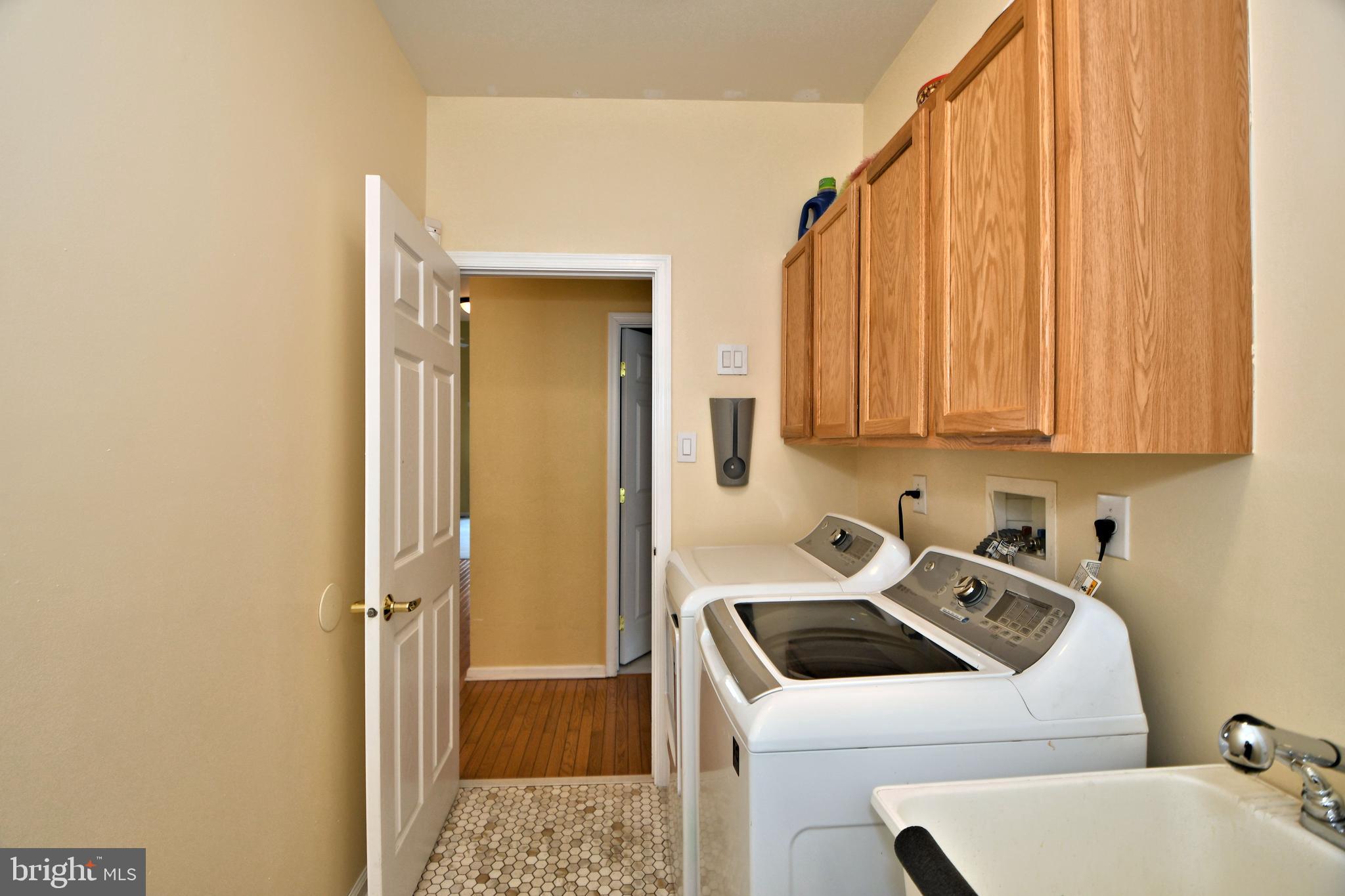19 Bluebonnet Road Langhorne, PA 19047 - Photo 40 of 51 Laundry room with new appliances and new floor