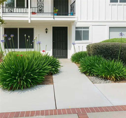 a potted plant sitting in front of a building