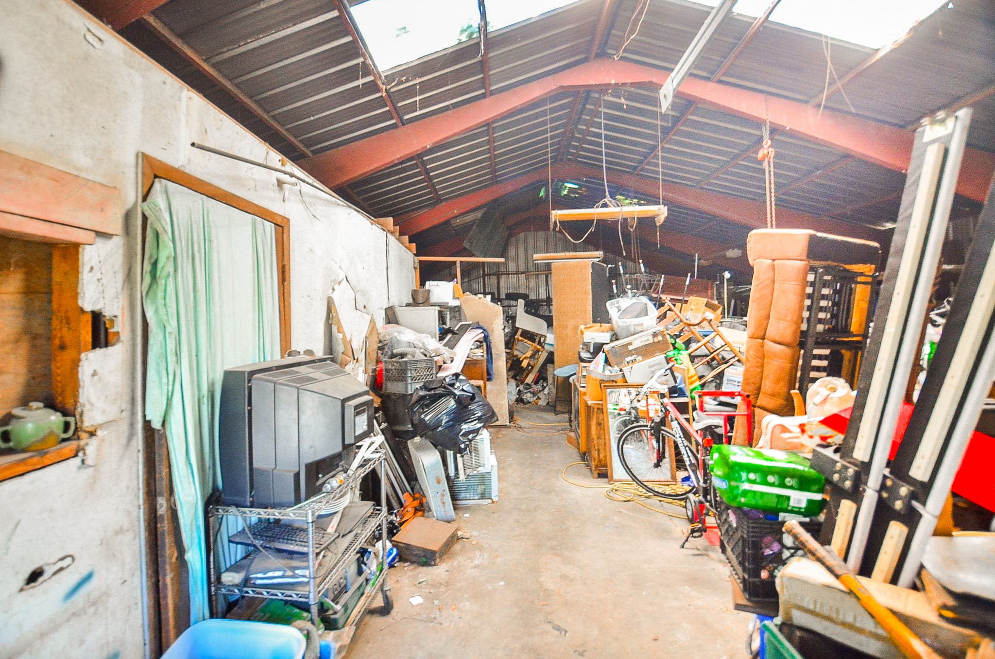 6531 New York Street Houston, TX 77021 - Photo 4 of 10 a view of a room with gym equipment