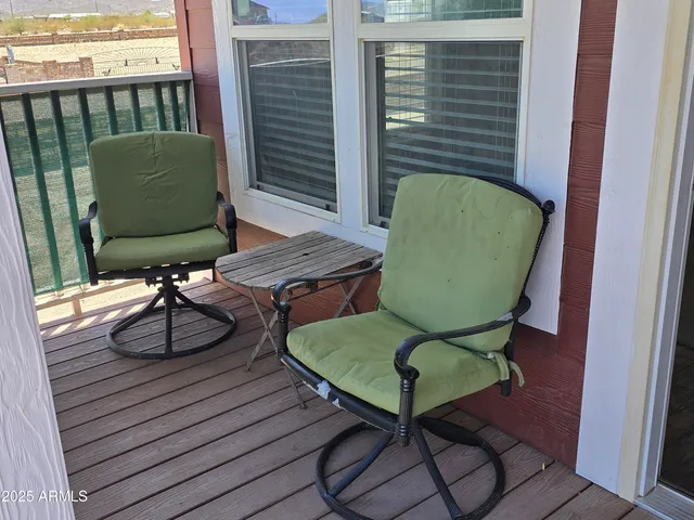 a view of a chairs in balcony