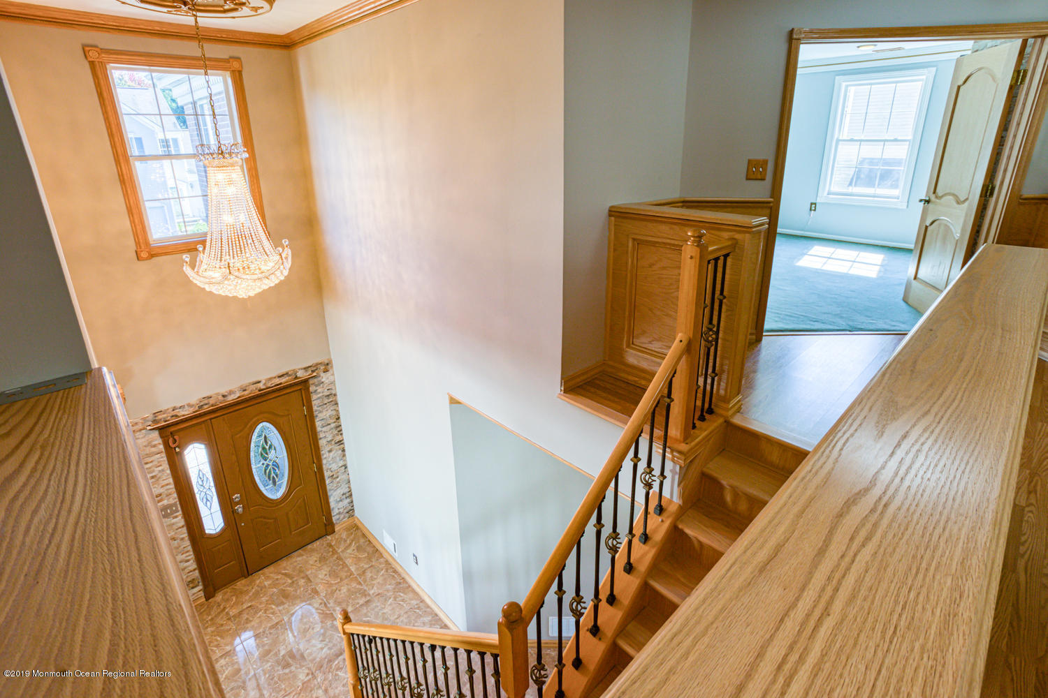 327 Wedgewood Road Morganville, NJ 07751 - Photo 12 of 33 a view of an entryway with wooden floor