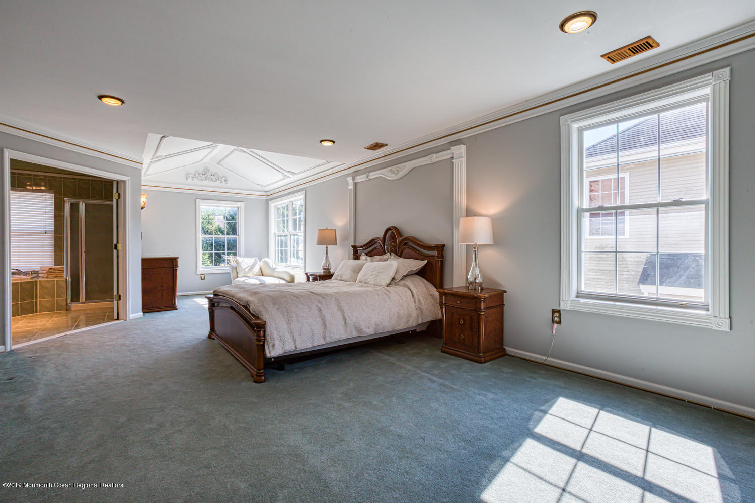 327 Wedgewood Road Morganville, NJ 07751 - Photo 13 of 33 a spacious bedroom with a bed and wooden floor