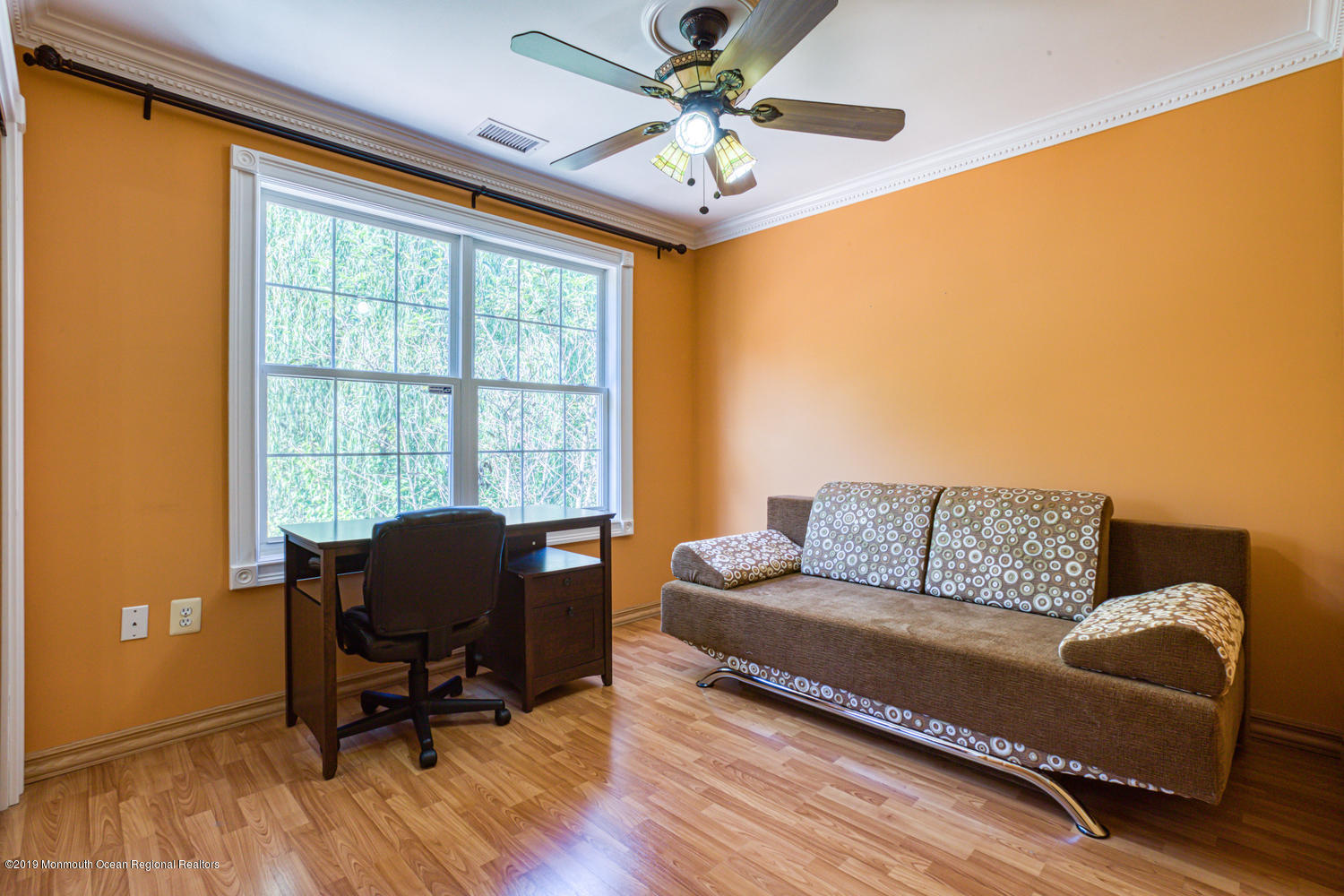 327 Wedgewood Road Morganville, NJ 07751 - Photo 18 of 33 a living room with furniture and a window