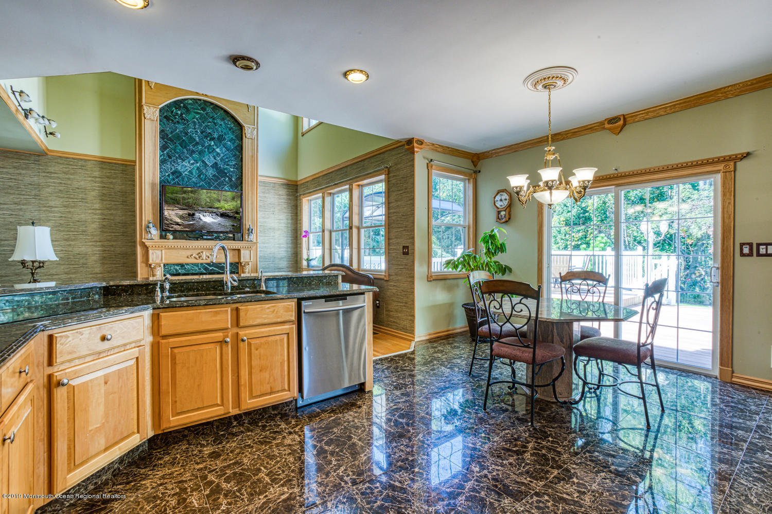 327 Wedgewood Road Morganville, NJ 07751 - Photo 4 of 33 a large swimming pool with chairs