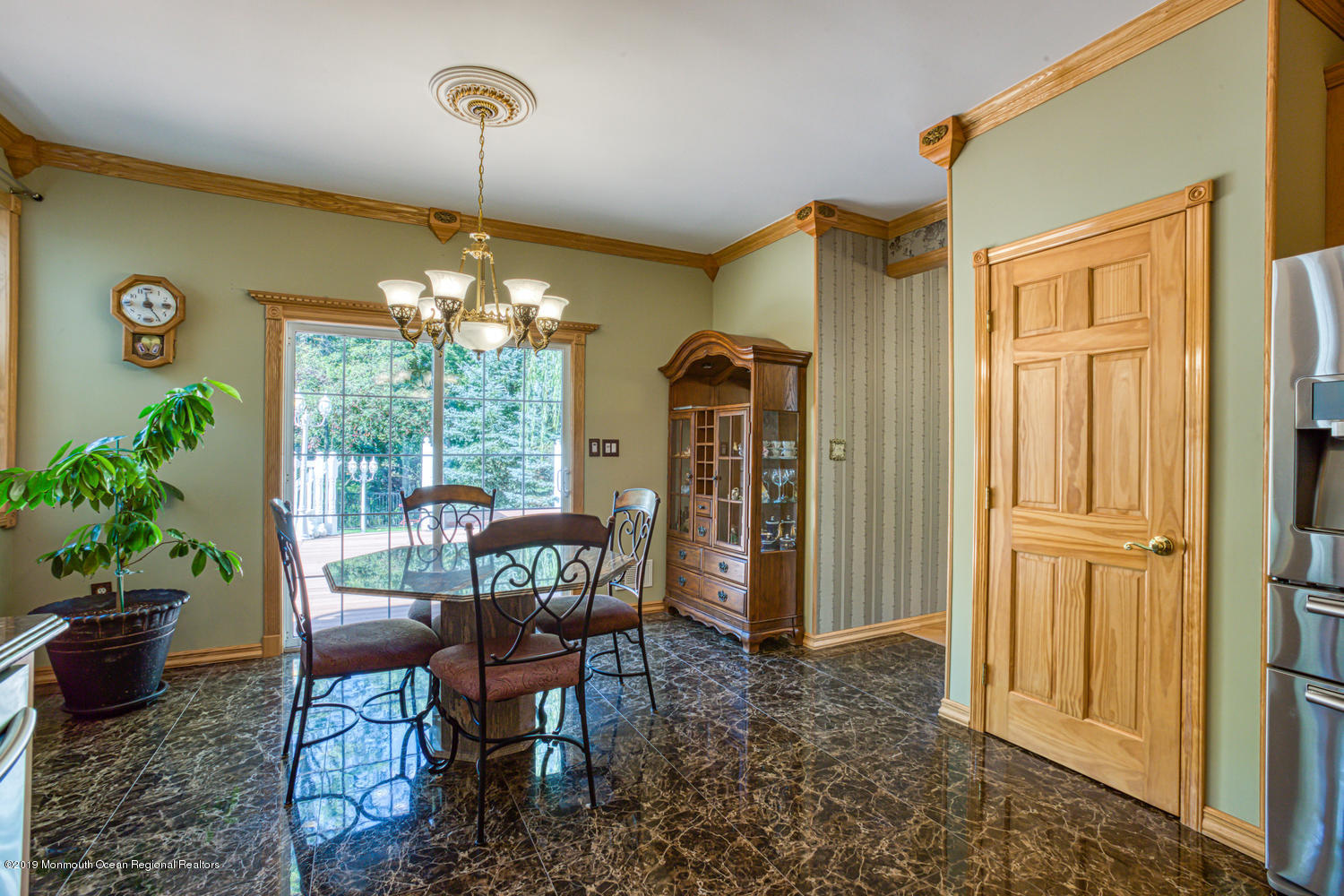 327 Wedgewood Road Morganville, NJ 07751 - Photo 7 of 33 a view of a dining room with furniture window and outside view