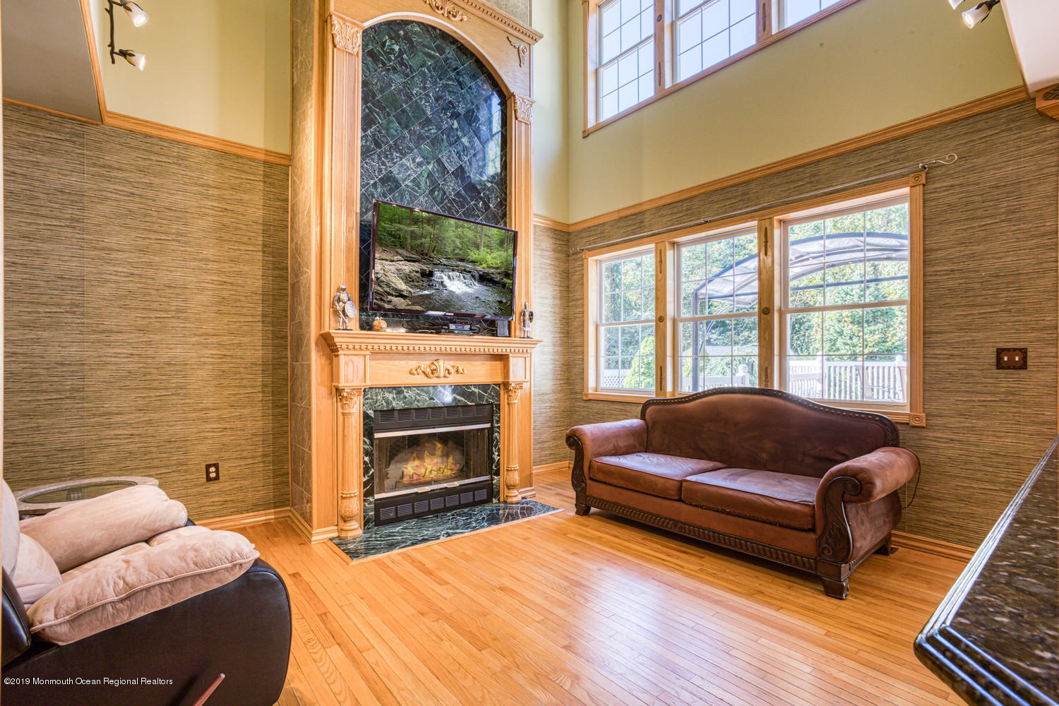 327 Wedgewood Road Morganville, NJ 07751 - Photo 8 of 33 a bedroom with a bed and a couch