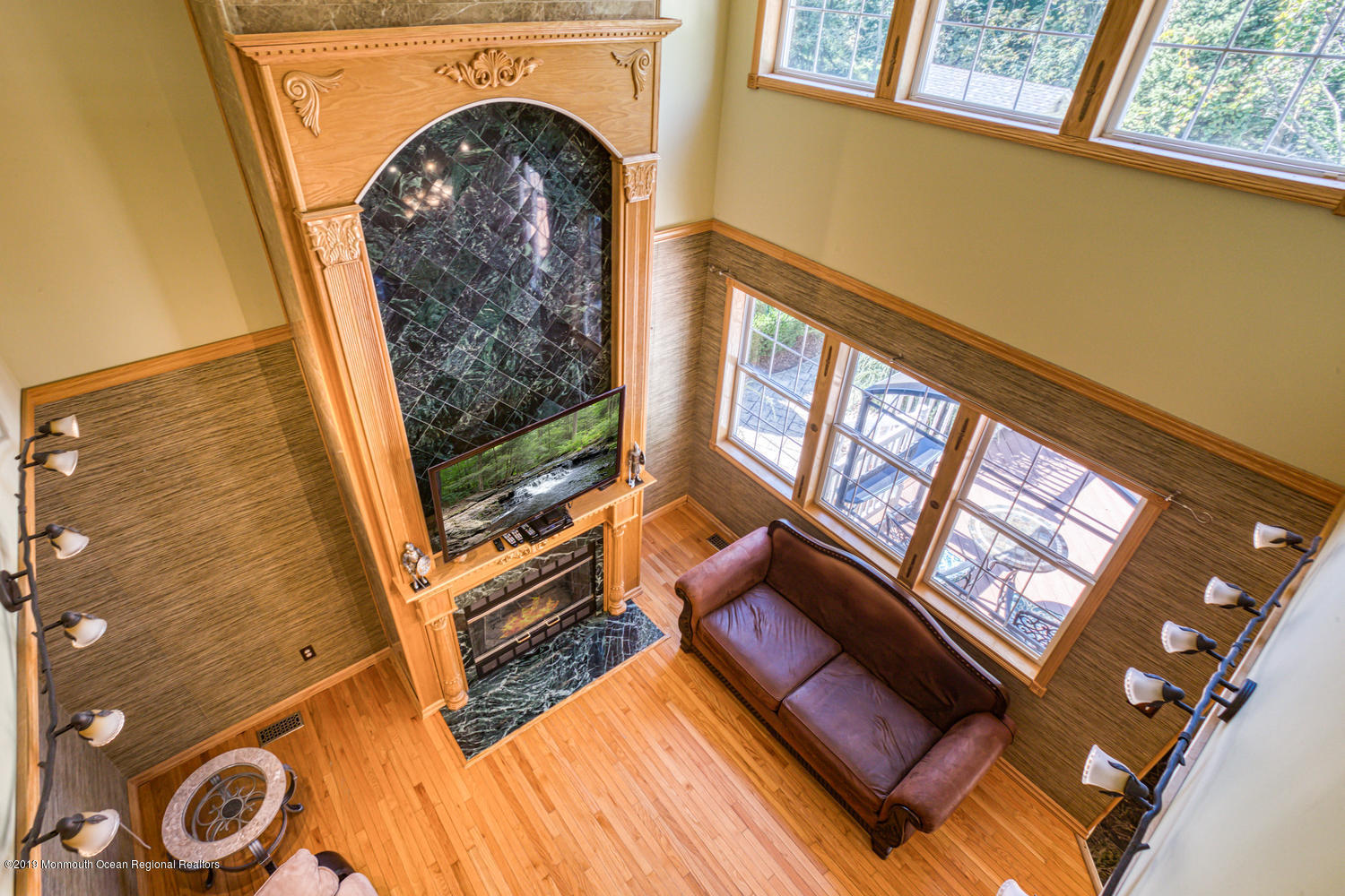 327 Wedgewood Road Morganville, NJ 07751 - Photo 9 of 33 a view of living room and a fireplace