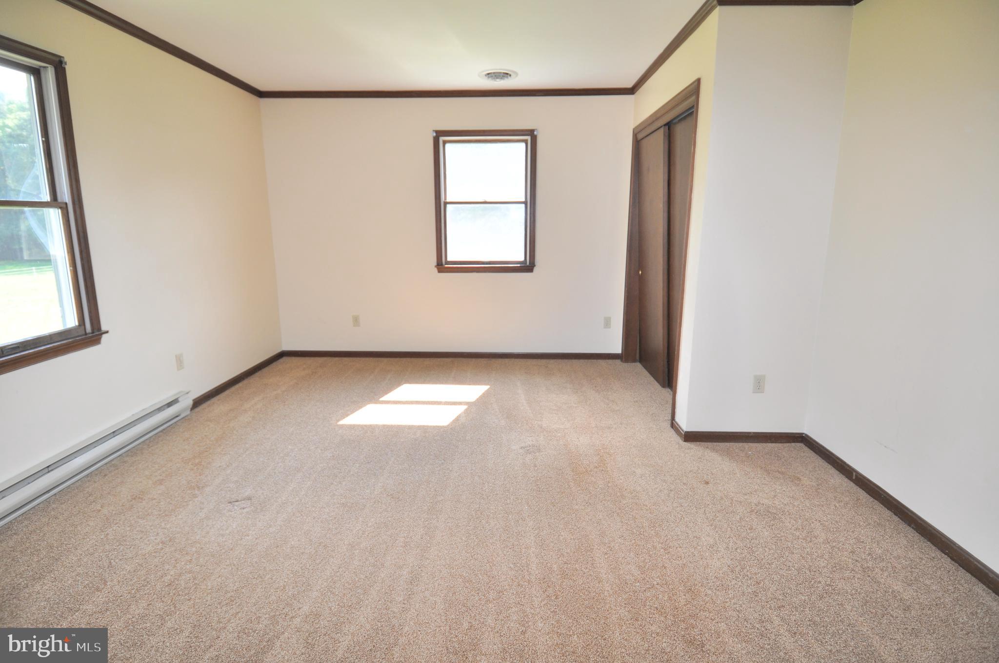 31881 Mitchell Road Princess Anne, MD 21853 - Photo 31 of 60 an empty room with a window