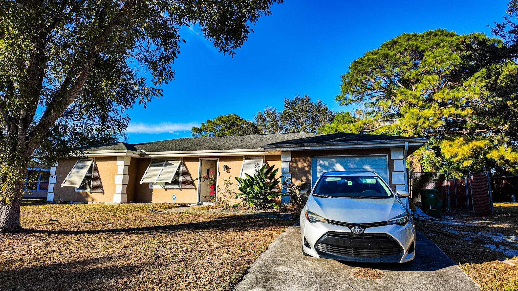 410 Southwest Kentwood Road Port St. Lucie, FL 34953 - Photo 1 of 13 FRONT YARD VIEW