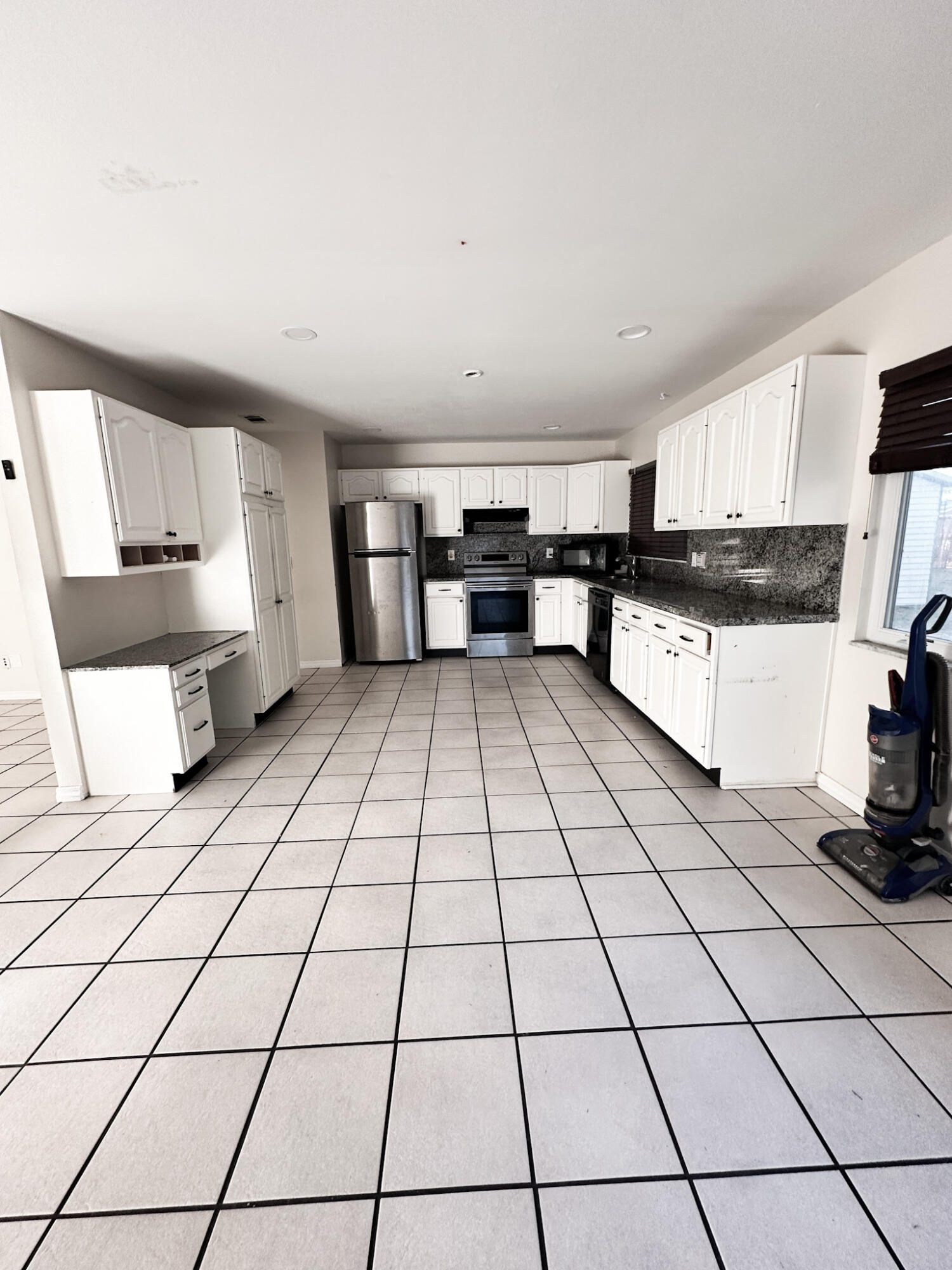 410 Southwest Kentwood Road Port St. Lucie, FL 34953 - Photo 6 of 13 KITCHEN