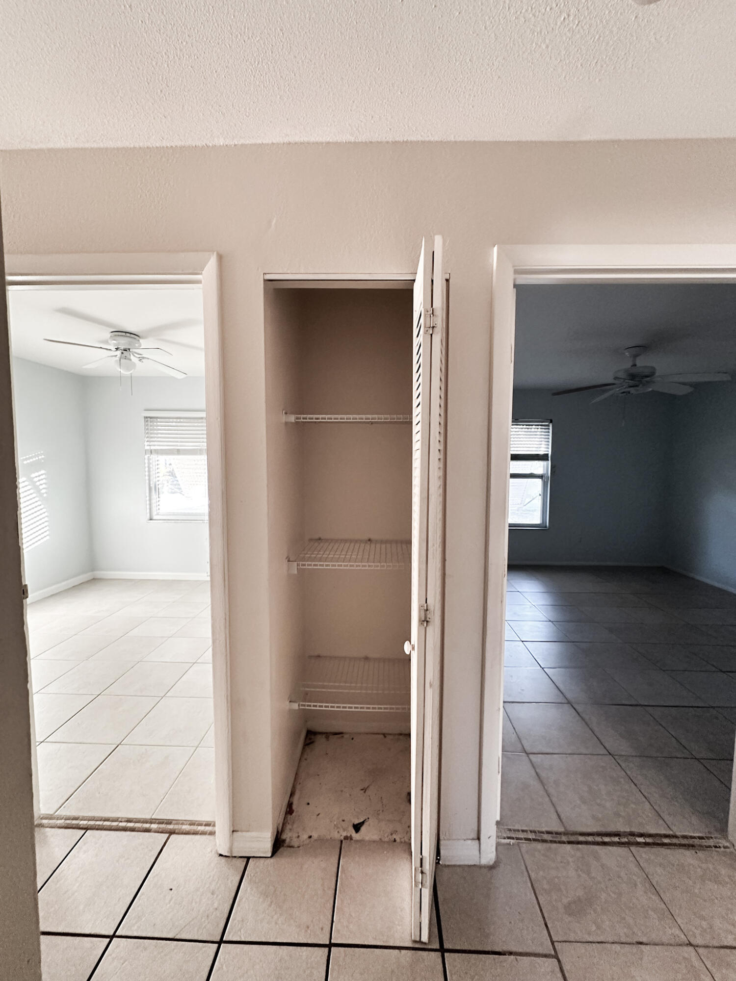 410 Southwest Kentwood Road Port St. Lucie, FL 34953 - Photo 7 of 13 HALLWAY CLOSET