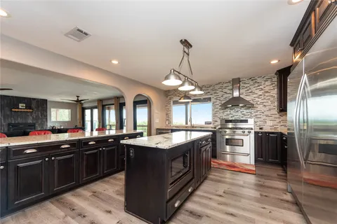 a kitchen with stainless steel appliances granite countertop counter top space a sink and stainless steel appliances