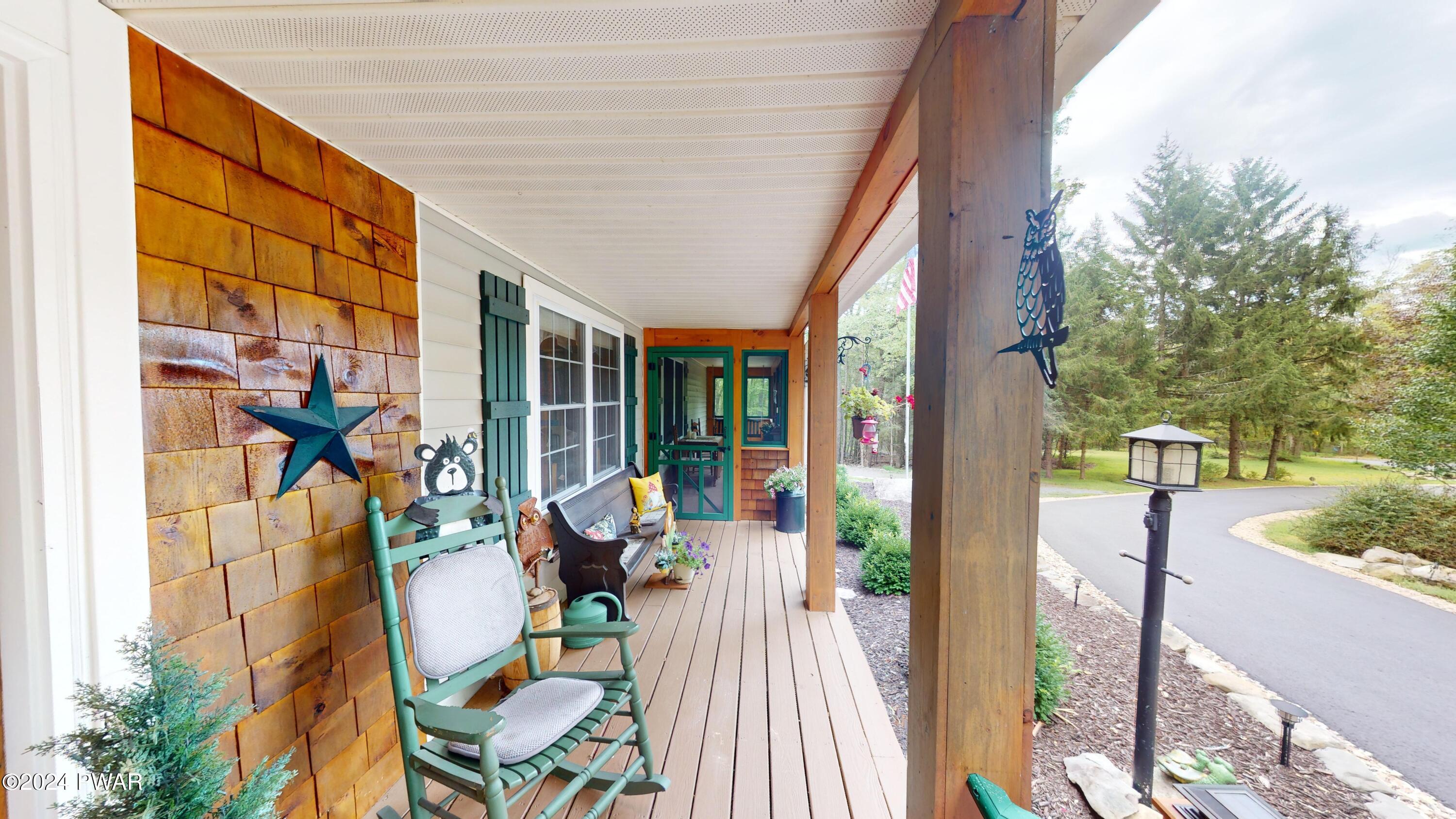 644 Raymondskill Road Milford, PA 18337 - Photo 11 of 65 Front porch & screen room