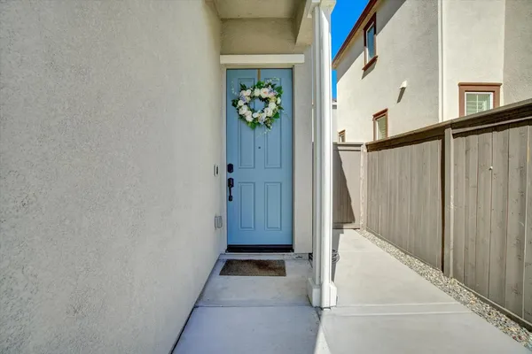 a view of front door with wooden floor