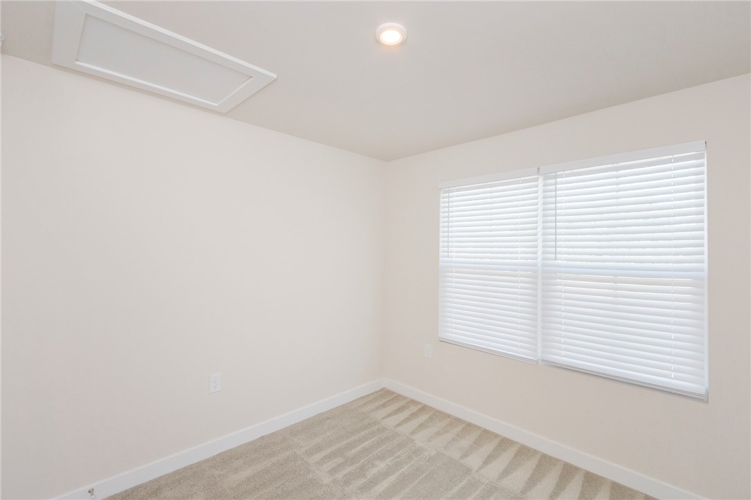 233 Scenic Road Anderson, SC 29621 - Photo 42 of 50 Recessed lighting and soft carpeting define this serene, ready-to-personalize bedroom.