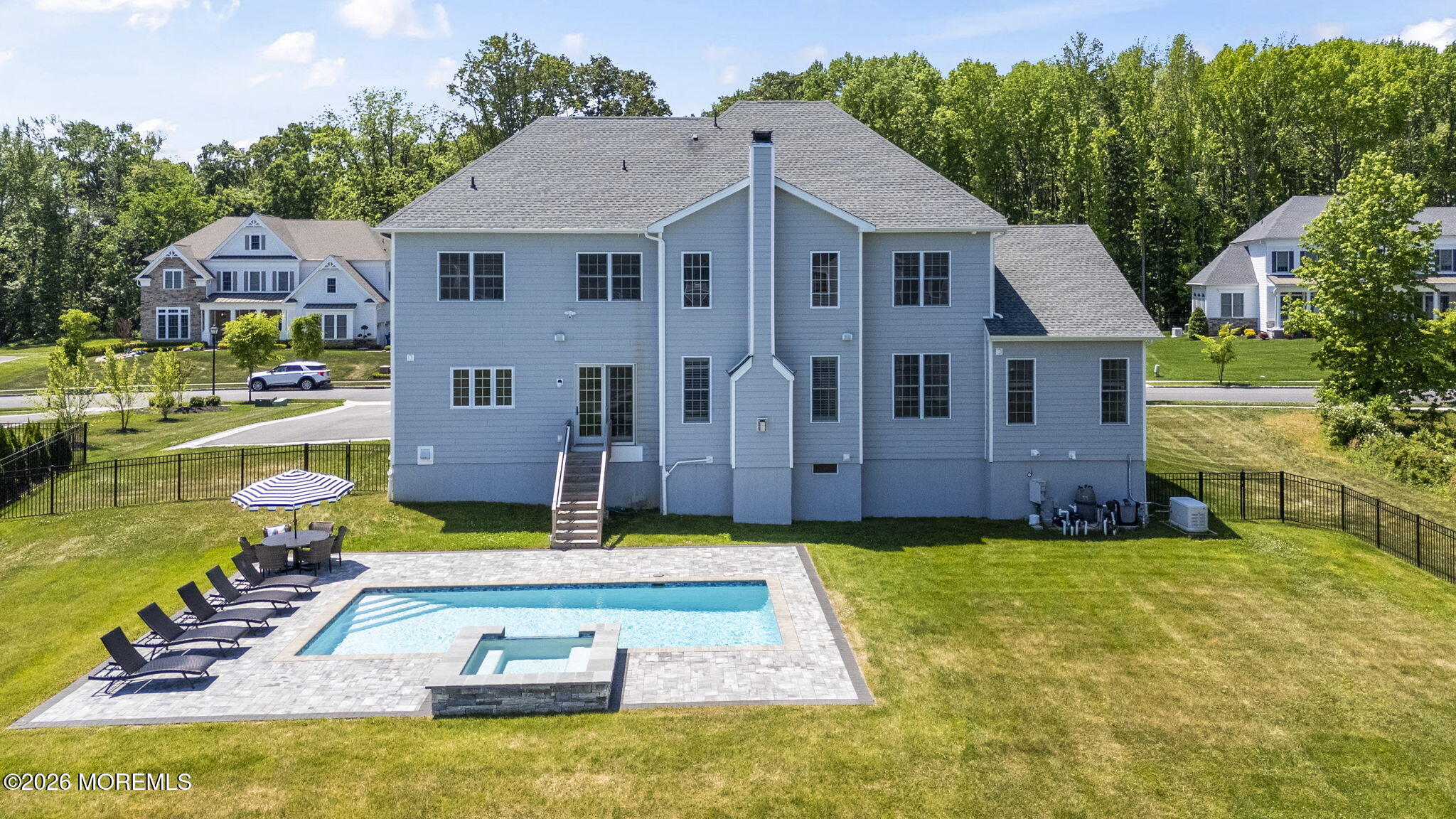 66 Windermere Road Lincroft, NJ 07738 - Photo 37 of 48 a view of a house with swimming pool
