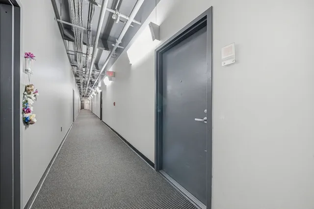 a view of a house with a tree