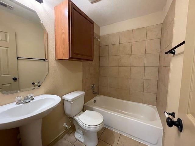 3953 Vista Mar Drive Fort Worth, TX 76040 - Photo 12 of 26 a bathroom with a sink a toilet and a bathtub
