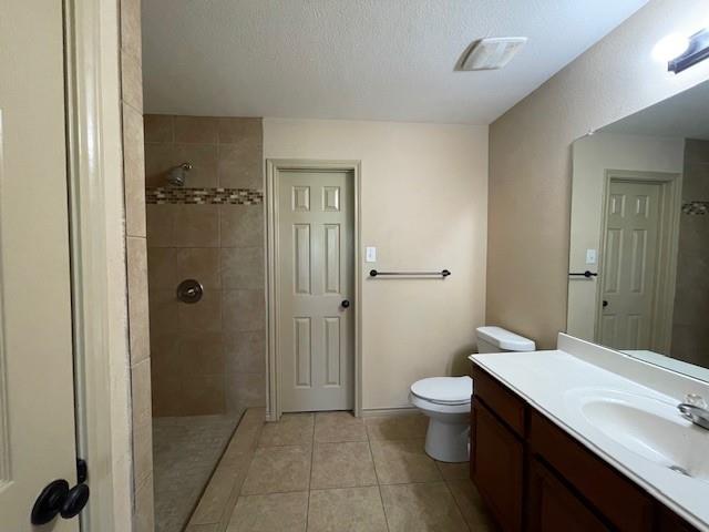 3953 Vista Mar Drive Fort Worth, TX 76040 - Photo 18 of 26 a bathroom with a sink a toilet a shower and a mirror