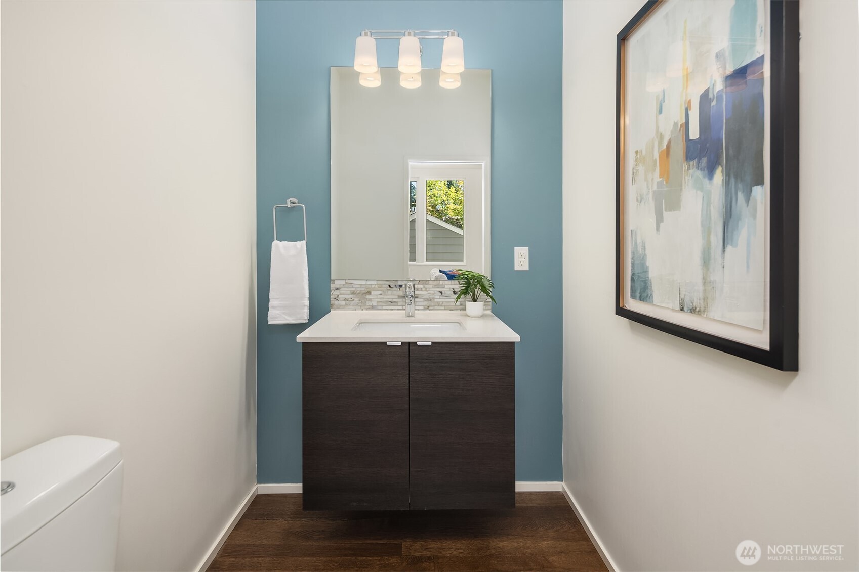 1256 Northeast 89th Street Seattle, WA 98115 - Photo 15 of 37 a bathroom with a sink and a mirror