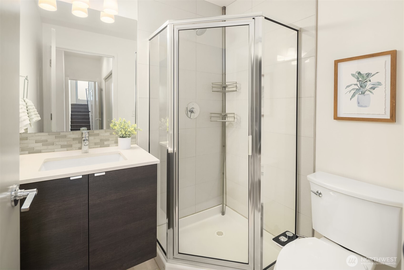 1256 Northeast 89th Street Seattle, WA 98115 - Photo 26 of 37 a bathroom with a shower sink vanity and mirror