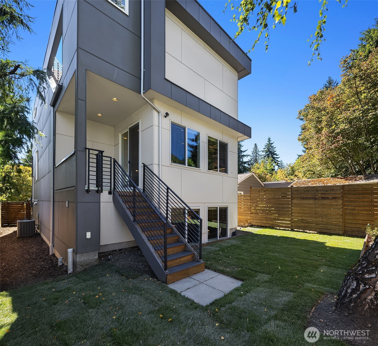 1256 Northeast 89th Street Seattle, WA 98115 - Photo 30 of 37 a view of a house with a yard