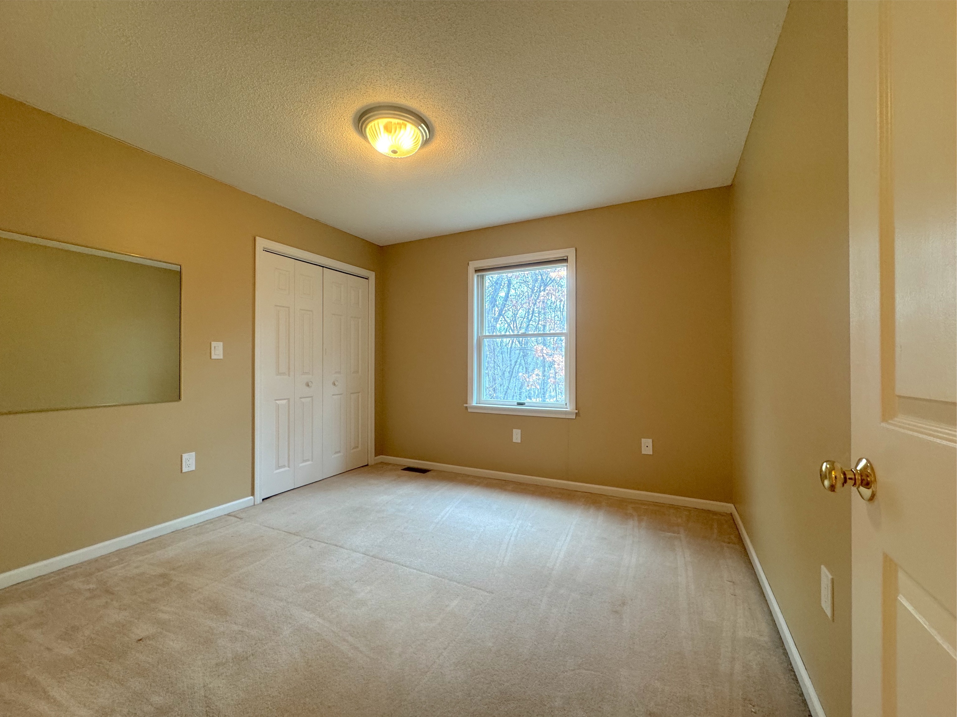 400 Windham Avenue Colchester, CT 06415 - Photo 15 of 33 a view of an empty room with a window