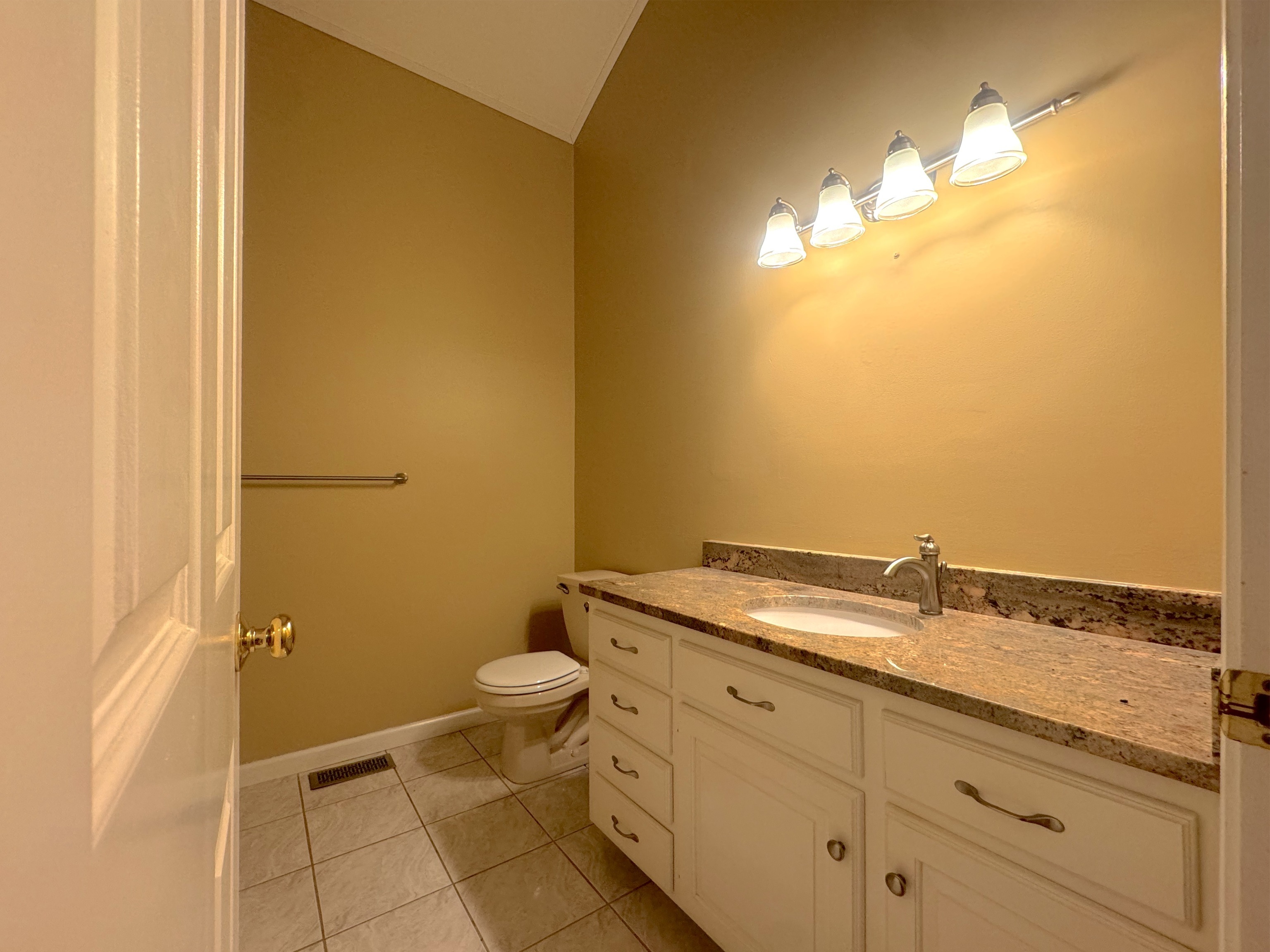 400 Windham Avenue Colchester, CT 06415 - Photo 16 of 33 a bathroom with a granite countertop sink and a mirror