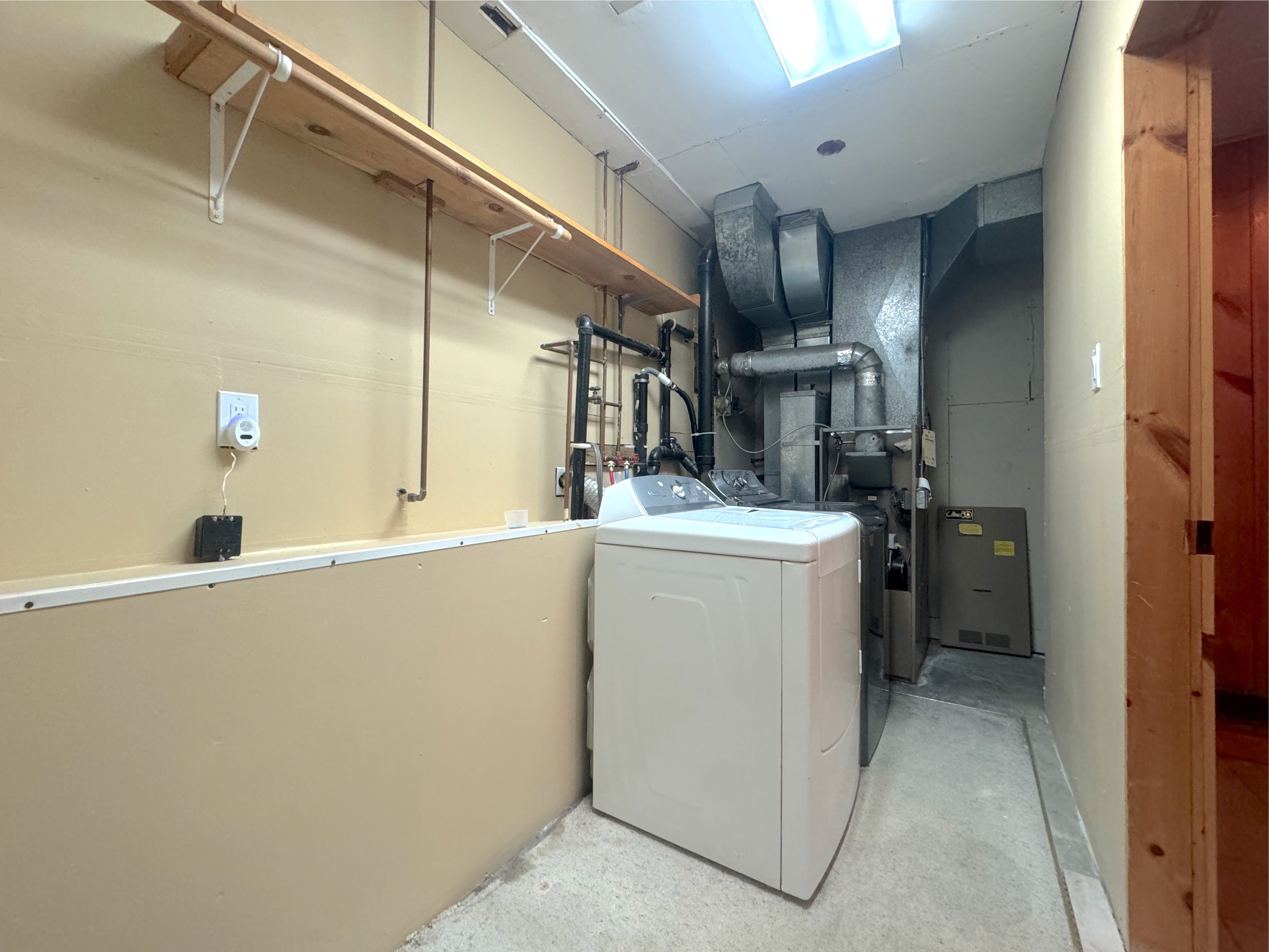 400 Windham Avenue Colchester, CT 06415 - Photo 27 of 33 a view of a storage & utility room with washer and dryer