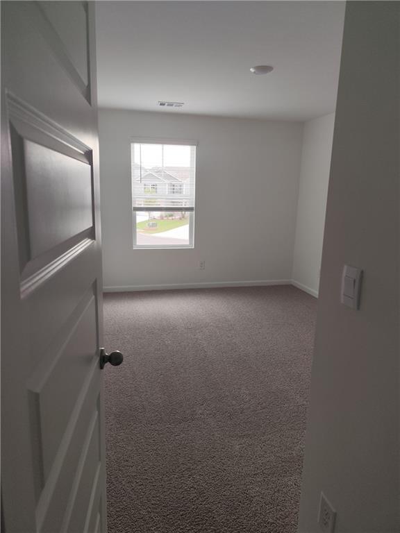 6128 Knickerbocker Street Mableton, GA 30126 - Photo 13 of 16 an empty room with windows