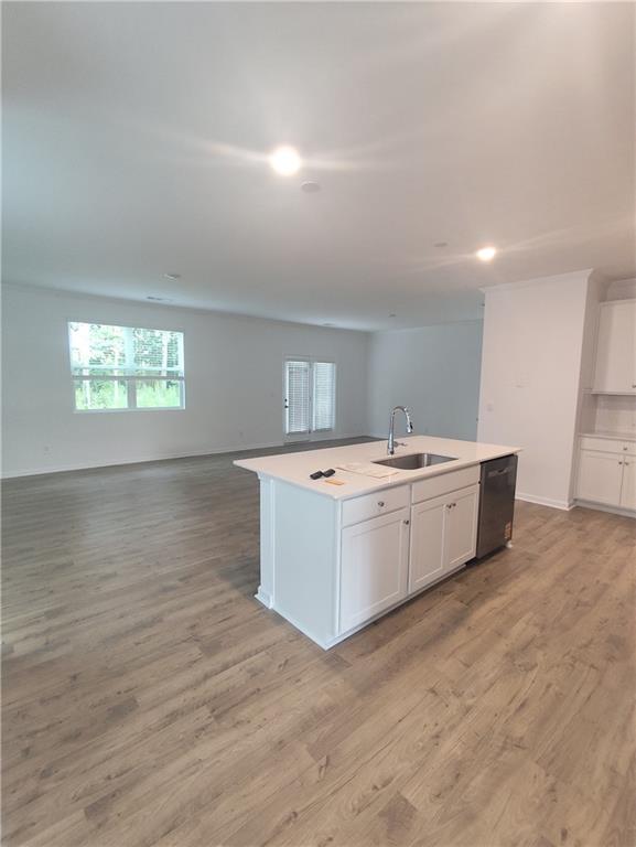 6128 Knickerbocker Street Mableton, GA 30126 - Photo 2 of 16 a room with a wooden floor and white walls
