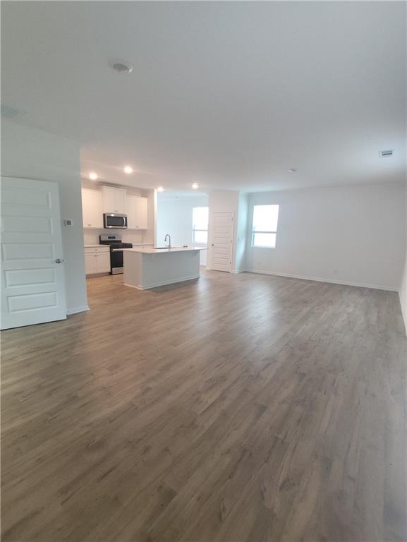 6128 Knickerbocker Street Mableton, GA 30126 - Photo 4 of 16 a view of a kitchen with a sink and cabinets