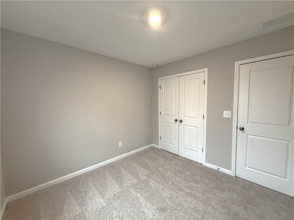 108 Seed Lane Pendergrass, GA 30567 - Photo 13 of 15 a view of an empty room and a window