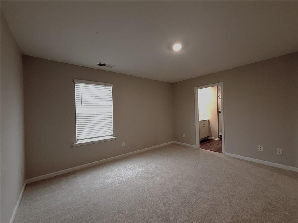 108 Seed Lane Pendergrass, GA 30567 - Photo 14 of 15 an empty room with a window