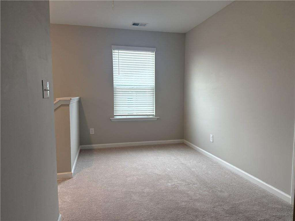 108 Seed Lane Pendergrass, GA 30567 - Photo 6 of 15 an empty room with a window