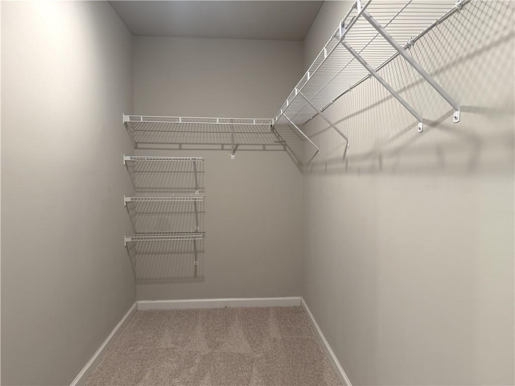 108 Seed Lane Pendergrass, GA 30567 - Photo 8 of 15 a view of a room with racks on the wall