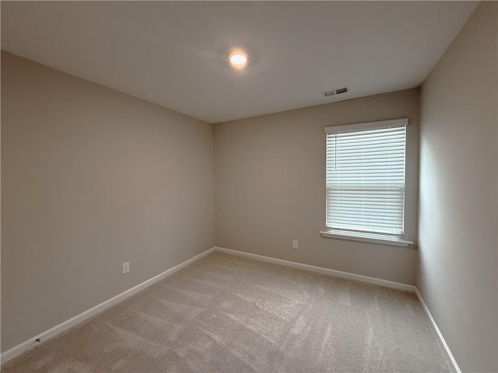 108 Seed Lane Pendergrass, GA 30567 - Photo 9 of 15 an empty room with a window